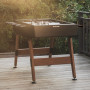 Baby-foot Origin noir sur une terrasse en bois