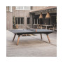 Table Origin Outdoor noir devant une maison