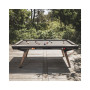 Billard Origin outdoor noir dans un jardin