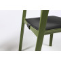 Coussin Trill Bistrot grafite clipsé sur la chaise agave