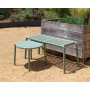 Banc Doga Bench menta et table basse Doga devant la jardinière